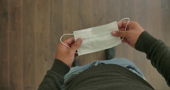 Putting The Mask On The Face alt