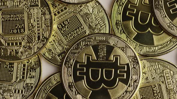 Rotating shot of Bitcoins  alt
