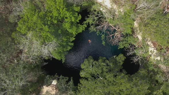 Tourist Relax in Open Cenote
