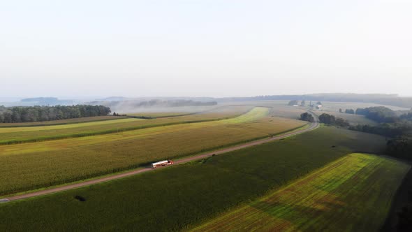 Truck travelling along a highway in Knox County Maine USA alt