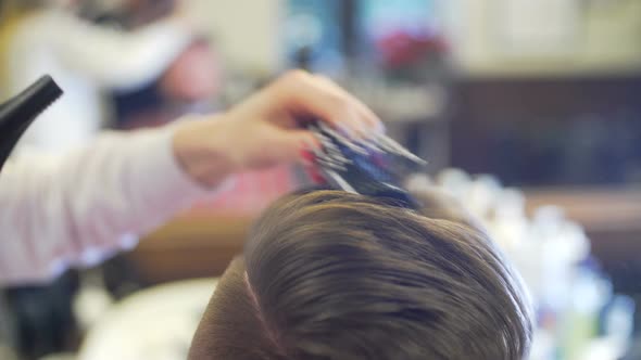 Young Man Getting Haircut and Hairstyle alt