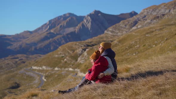 Family of Tourists Visits the Sedlo Pass Bobov Kuk in the Mountains of the Northern Montenegro alt