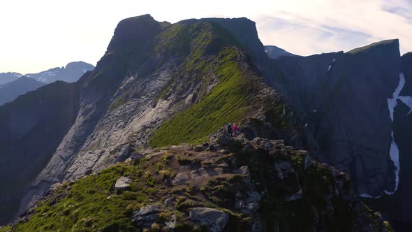 Flying Around Mount Reinebringen with Tourists in the Lofoten Islands Norway alt