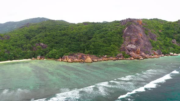 Flying Above Anse Source D'argent Beach at the La Digue Island Seychelles alt