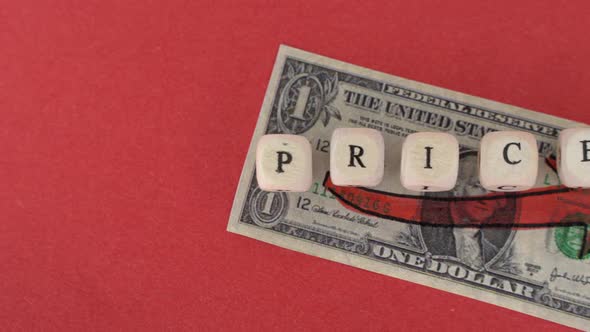 US Dollar Bill with a Red Arrow Going Up with the Word Prices on Top