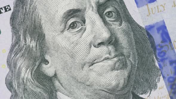 Shot of the Rotating Benjamin Franklin's Face on the 100 Hundred Dollar Bill