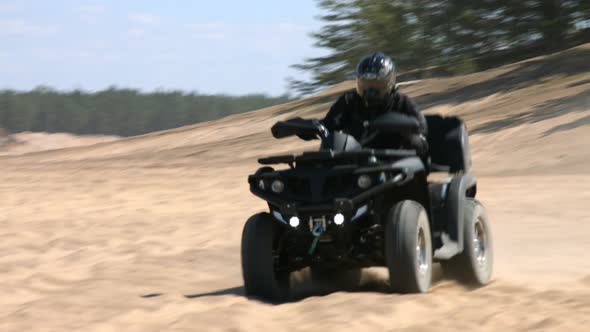 Atv Driving On Sand Desert alt