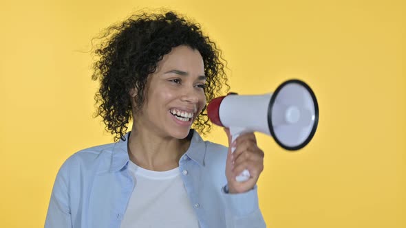 Portrait of Casual African Woman Making Announcement on Loudspeaker alt
