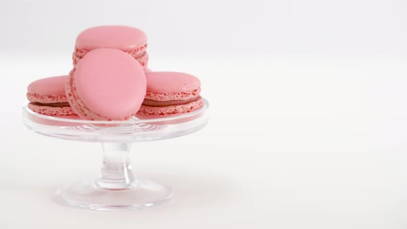 Pink Macarons on Glass Confectionery Stand alt