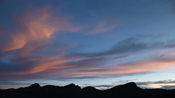 Camera Movement Over the Tops of the Mountains with a Beautiful Sunset