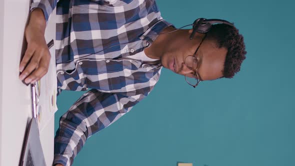 Call Center Worker Talking to Client on Headset with Microphone alt