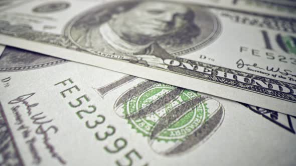 American One Hundred Dollar Paper Banknote Pile on Office Desk alt