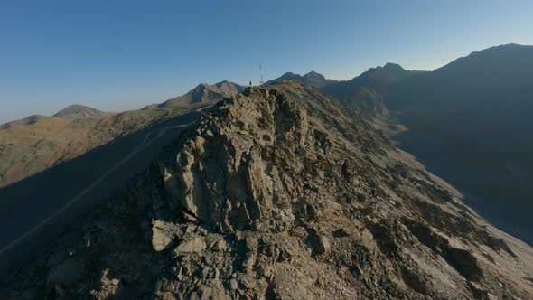Aerial Panorama View Male Winner Standing on Mountain Ridge Peak Sun Lights Nature Landscape alt