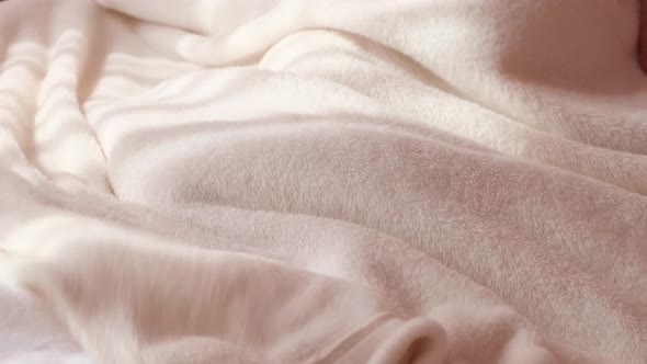 Couple in Bed Wakes Up in the Morning Male and Female Legs Top View White Linen alt