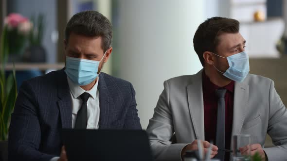 International Business Group Discuss Marketing Wear Face Mask in Diverse Office alt