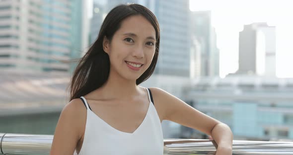Asian young woman in city 