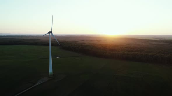 Alternative Wind Energy Windmill At Sunset