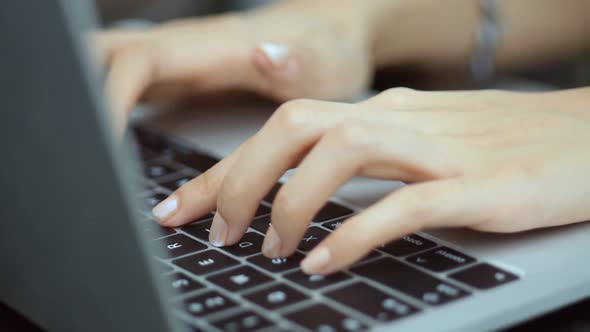 Businesswoman using a laptop computer.