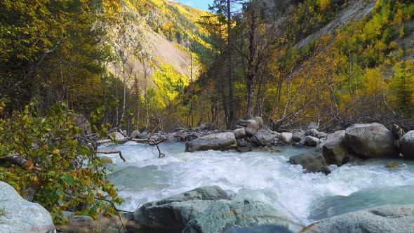 Mountain river in the autumn mountains. A turbulent current. Georgia, Svaneti. alt