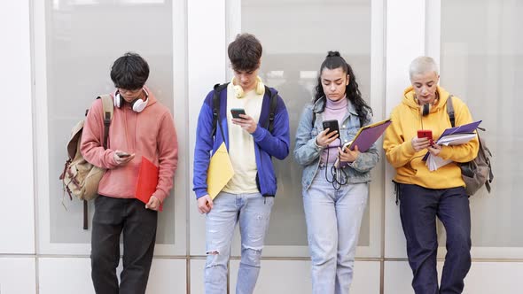 Teenager Students Using Smart Mobile Phones in College School Online Internet Social Media and alt