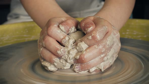 Child Hands Making Clay Pottery 9 alt