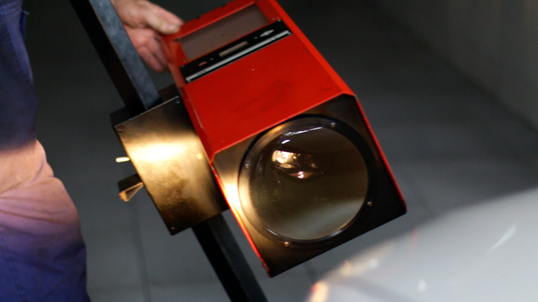 Car Repair Adjusting Headlights alt