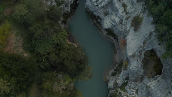 Flying over Marmitte dei Giganti, gorge in Italy Marche 4K alt