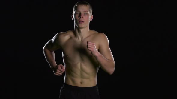 Muscular Man Running. Black alt