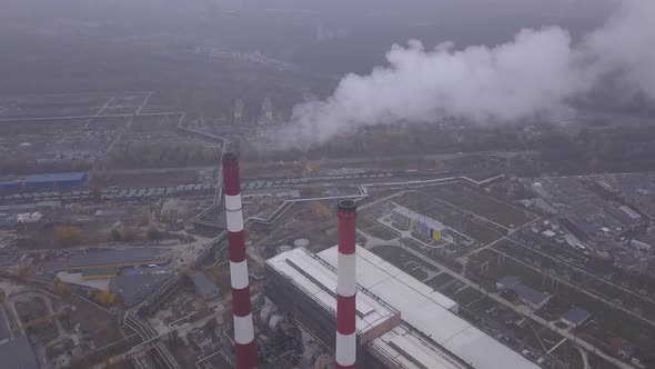 Smoke Comes From the Chimney. Aerial. Air Pollution. Ecology. Kyiv. Ukraine. alt