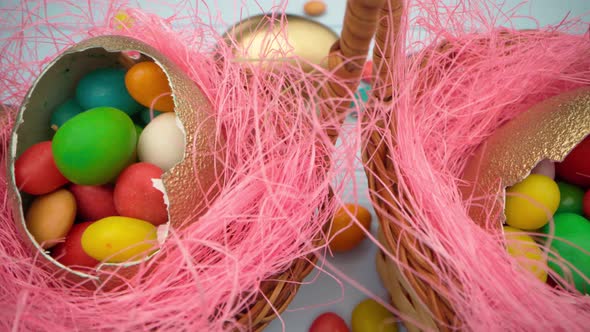 Easter Egg with Colorful Candies in a Basket Close Up