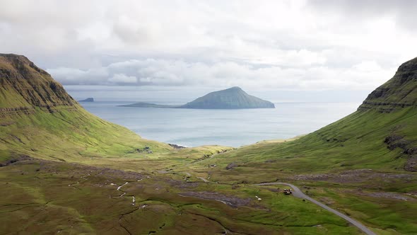 Aerial View of Wilderness Natureislands Ocean Green Mountain and Rock Cliffs alt
