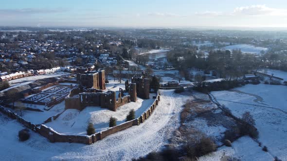 Kenilworth Castle Ruins In Snow High Aerial Winter Warwickshire UK