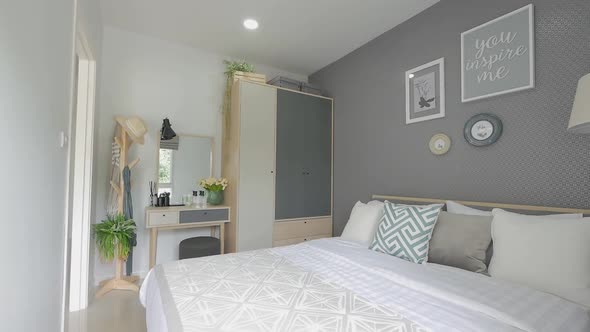 Clean White Bedroom With Natural Lighting alt