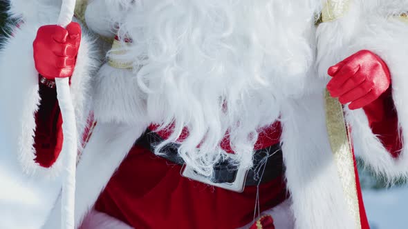 Tilt up of Santa Claus' costume alt