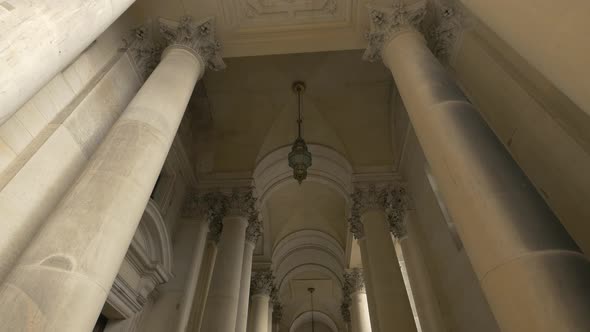 Columns and arches in a portico alt