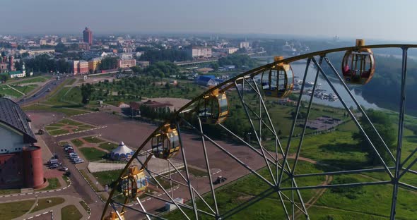 Aerial Top View Flying Over the Ferris Wheel alt
