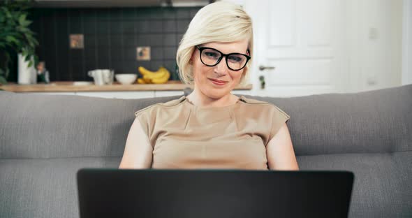 Woman Working on Laptop