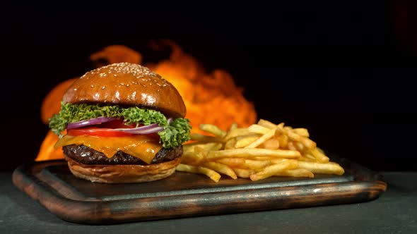 Super Slow Motion Shot of Hamburger French Fries and Flames at 1000Fps alt