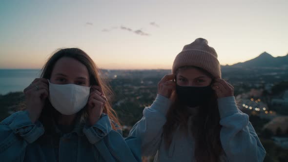Portrait of Young Female Friends in Medical Masks