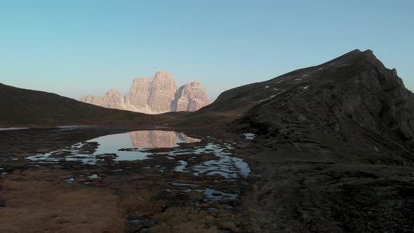 Aerial Fly over Mountain Lake in Dolomites Italy South Tyrol alt