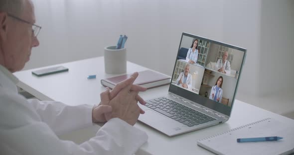 Close Up of Male Talk on Video Call Consult with Diverse Doctors Colleagues, Man Have Online alt