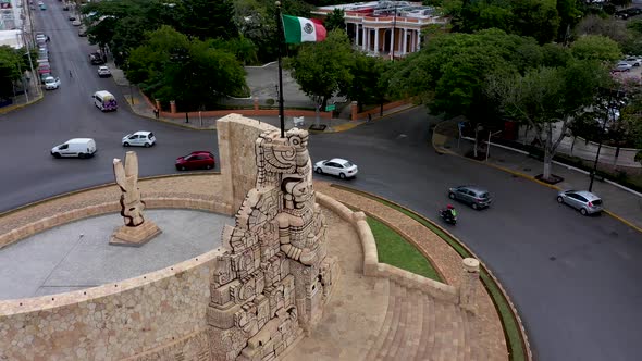Closeup aerial descent on side of the Monument a la Patria, Homeland Monument on the Paseo de Montej alt