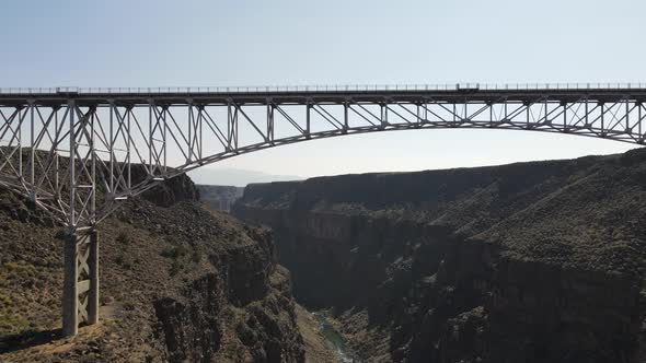4k drone video of Rio Grande Gorge Bridge in New Mexico. alt