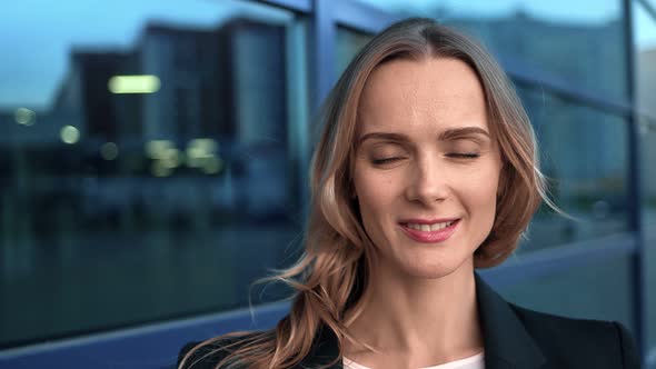 Closeup Face of European Office Worker Laughing Enjoy Break alt