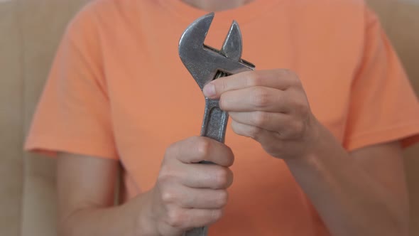 Repair Woman with a Spanner. alt