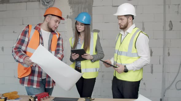 Young Architects Checking New Blueprints