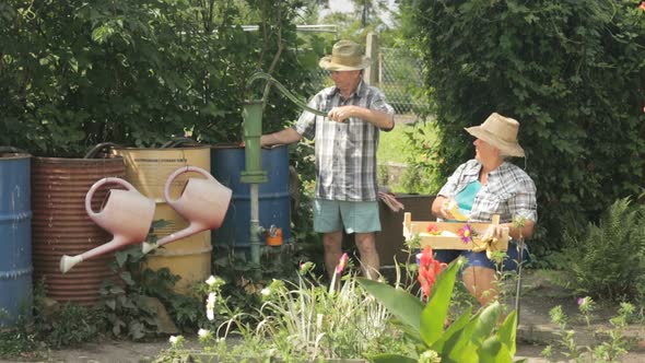 Farming Couple in Garden