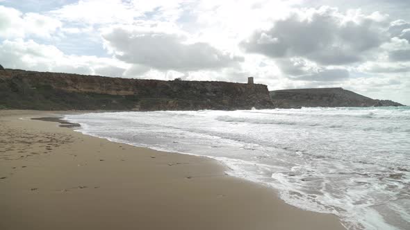 Golden Bay near Rocky Hills with Mediterranean Sea Washing Sandy Beach