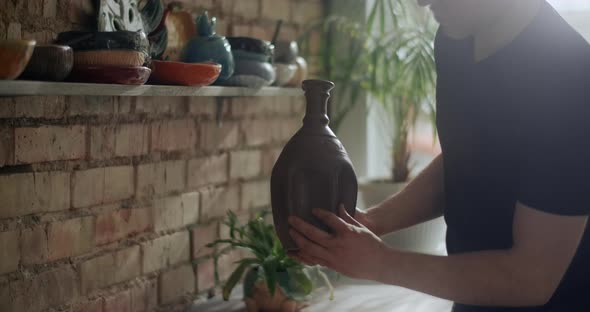 Potter Finalises a Clay Jug at His Workshop Video From Pottery Workshop Making the Ceramics in Slow alt