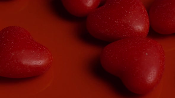 Rotating stock footage shot of Valentines decorations and candies - VALENTINES 0059 alt